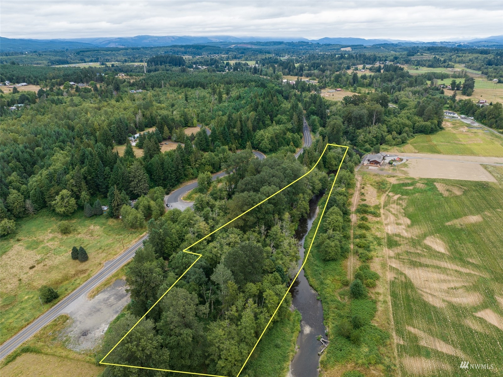 0 State Route 508 Chehalis, WA 98532 - Photo 13 of 21 a view of a city with lush green forest