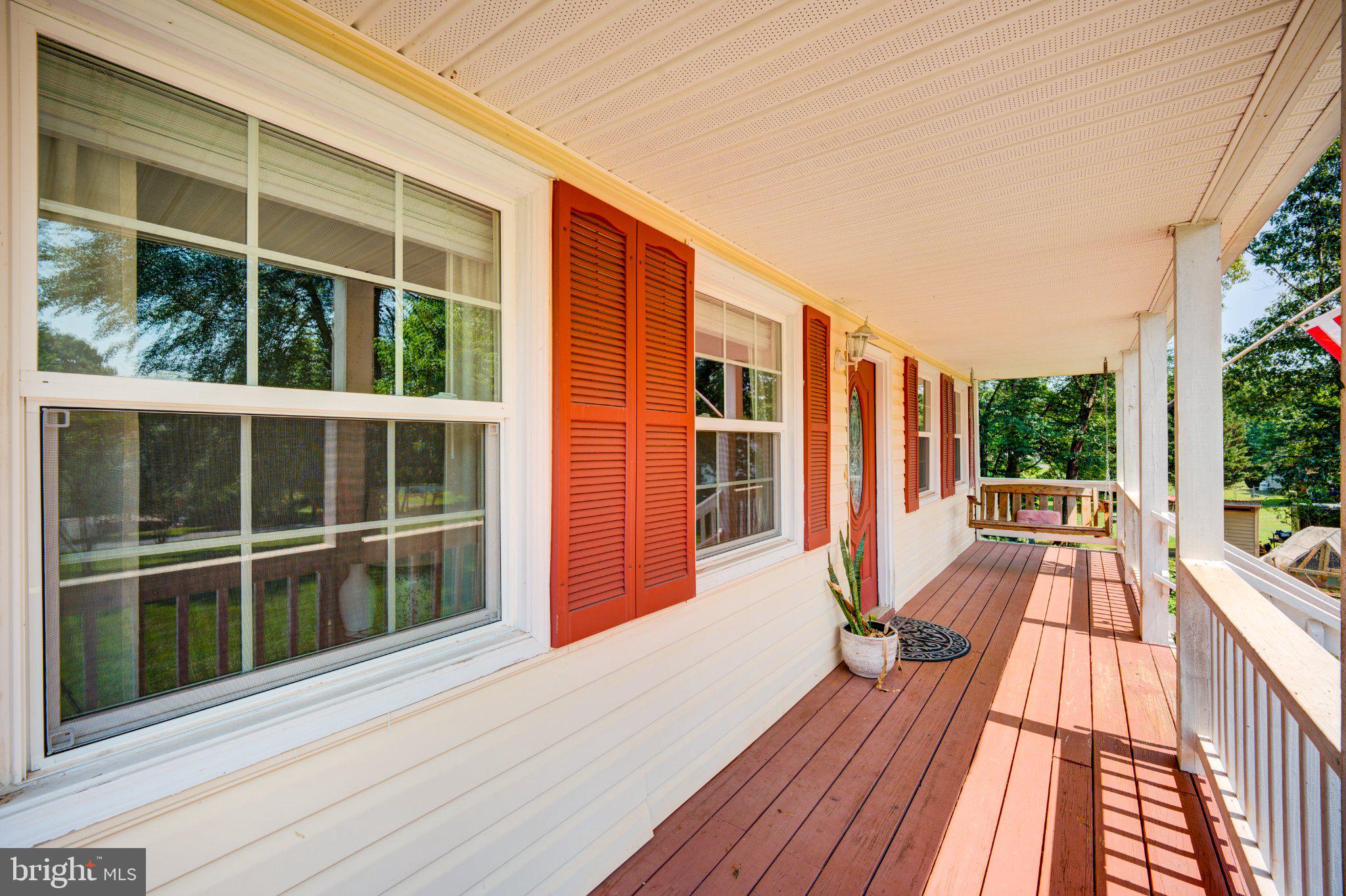 9595 Roys Lane Culpeper, VA 22701 - Photo 47 of 61 Charming porch with vibrant shutters.