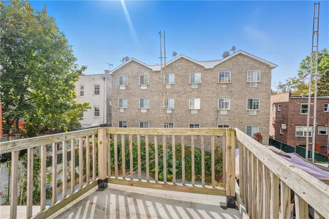 a view of a street from a balcony