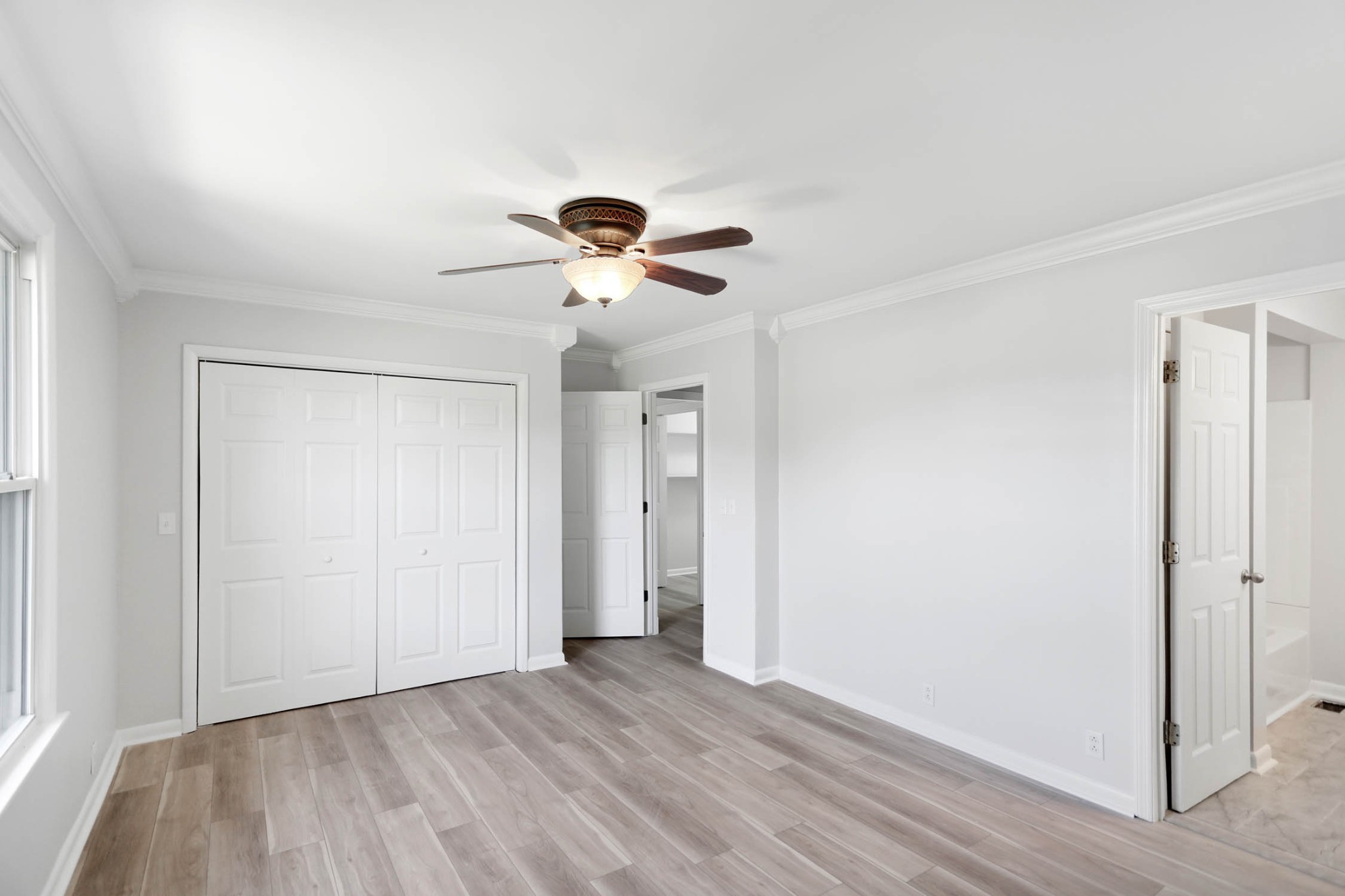 211 General Forrest Drive Springfield, TN 37172 - Photo 16 of 23 a view of an empty room with wooden floor