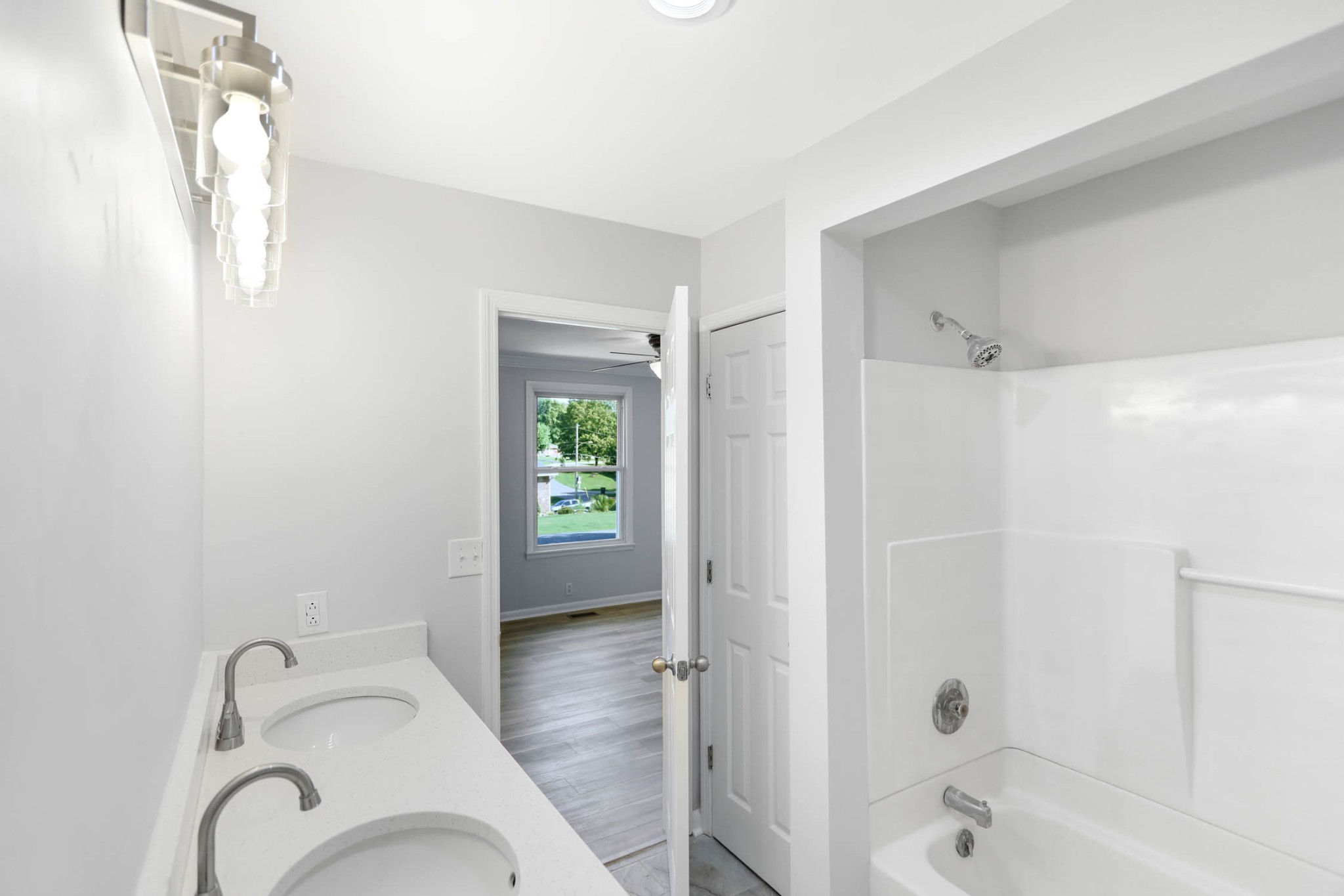 211 General Forrest Drive Springfield, TN 37172 - Photo 17 of 23 a bathroom with a tub shower vanity and a sink
