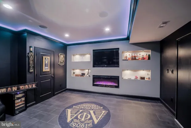 a view of a house with swimming pool and sitting area