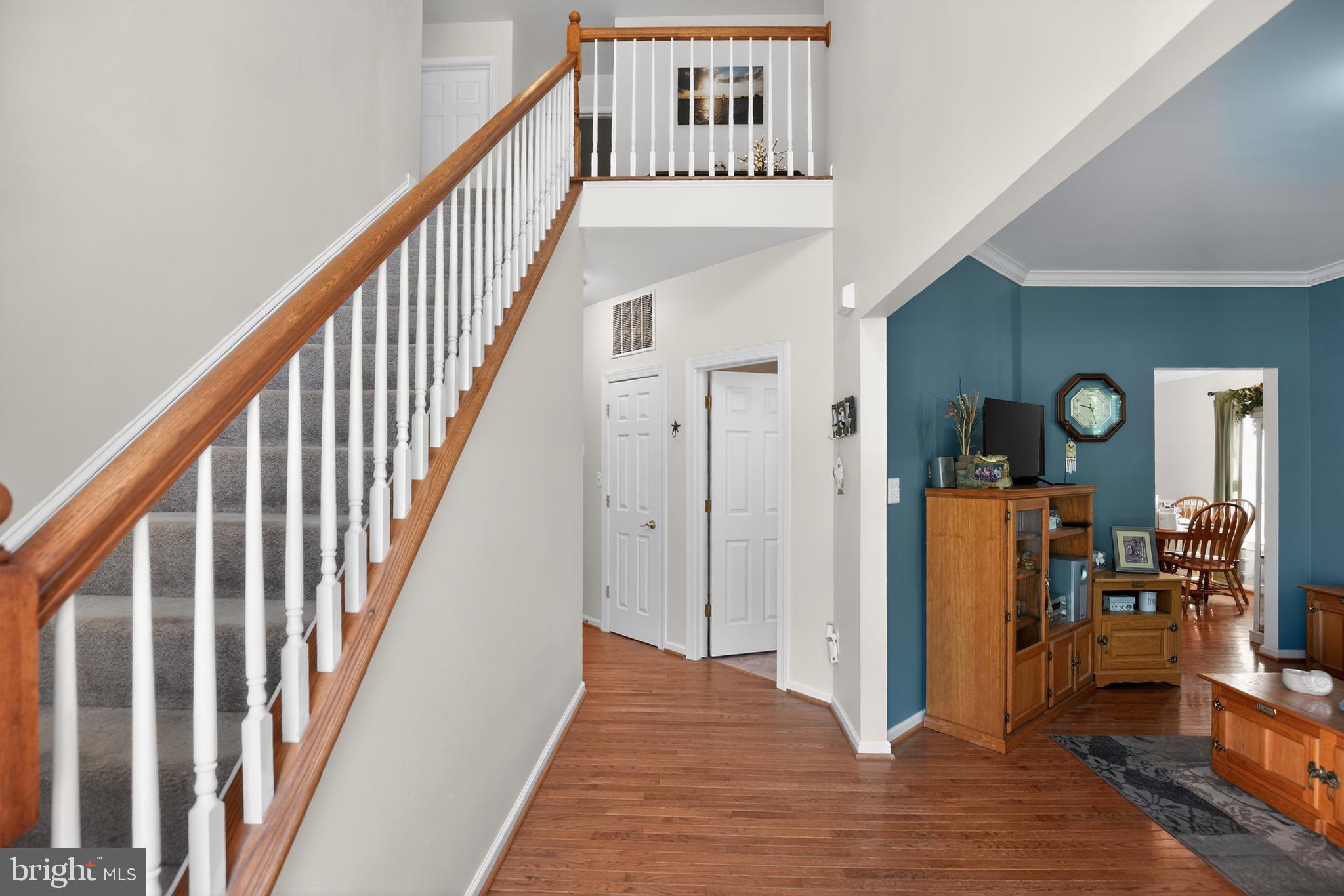 1810 Rudolph Lane Lusby, MD 20657 - Photo 7 of 40 Two story entry foyer w/hardwood floors