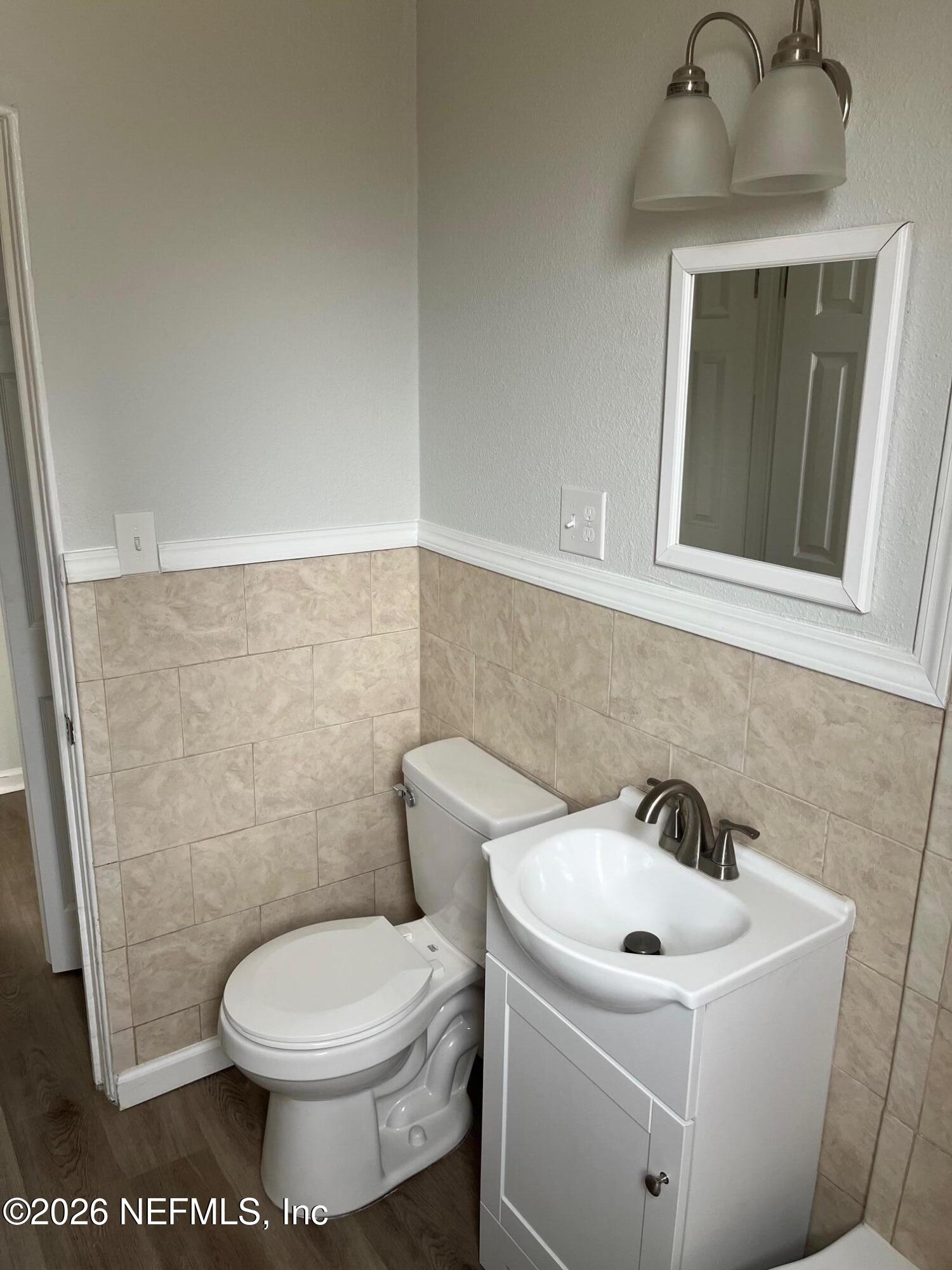 10547 Briarcliff Road East Jacksonville, FL 32218 - Photo 7 of 33 a bathroom with a sink and a toilet