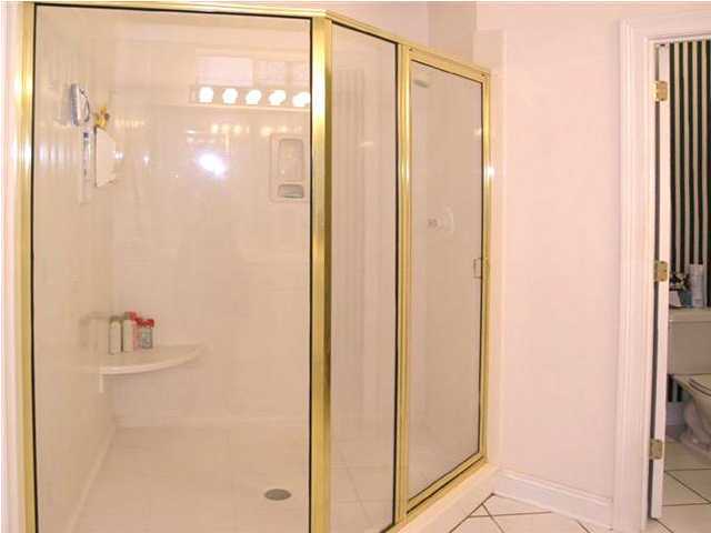 170 Indigo Loop Miramar Beach, FL 32550 - Photo 12 of 15 a bathroom with a glass shower door