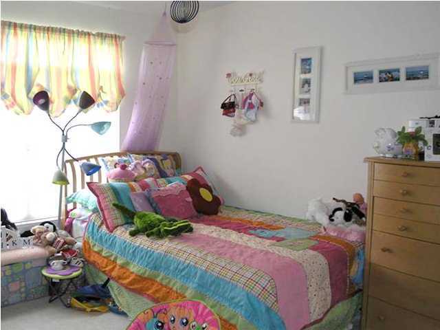 170 Indigo Loop Miramar Beach, FL 32550 - Photo 13 of 15 a bedroom with a bed and a window