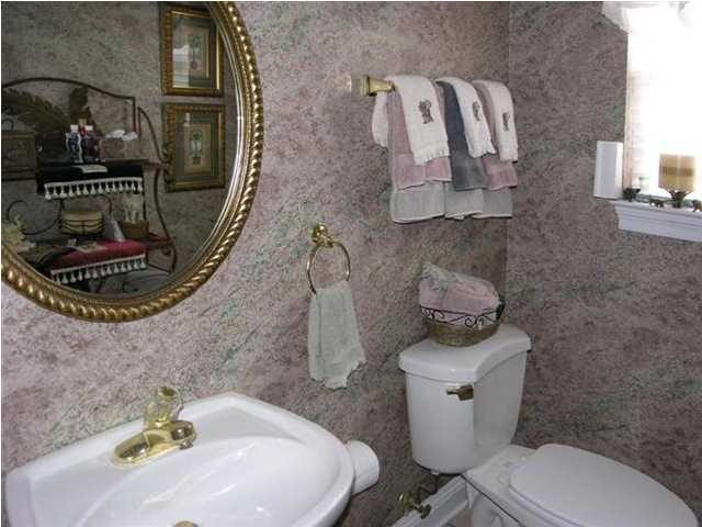 170 Indigo Loop Miramar Beach, FL 32550 - Photo 14 of 15 a bathroom with a sink toilet and mirror