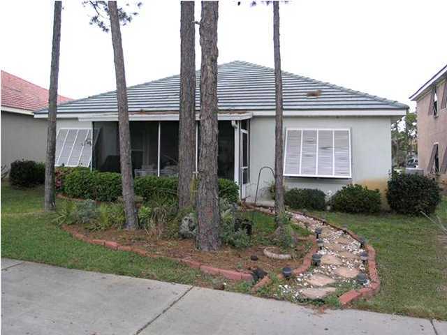 170 Indigo Loop Miramar Beach, FL 32550 - Photo 15 of 15 a front view of a house with garden