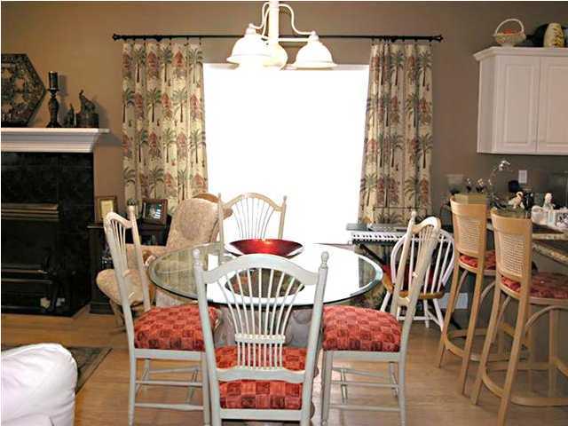 170 Indigo Loop Miramar Beach, FL 32550 - Photo 3 of 15 a view of a dining room with furniture and chandelier