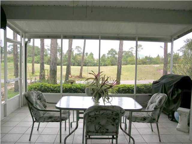 170 Indigo Loop Miramar Beach, FL 32550 - Photo 9 of 15 a living room with furniture and a large window