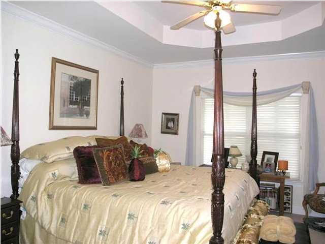 170 Indigo Loop Miramar Beach, FL 32550 - Photo 10 of 15 a bedroom with a bed window and lamp