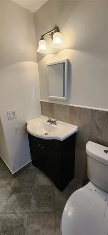 a bathroom with a sink and a toilet