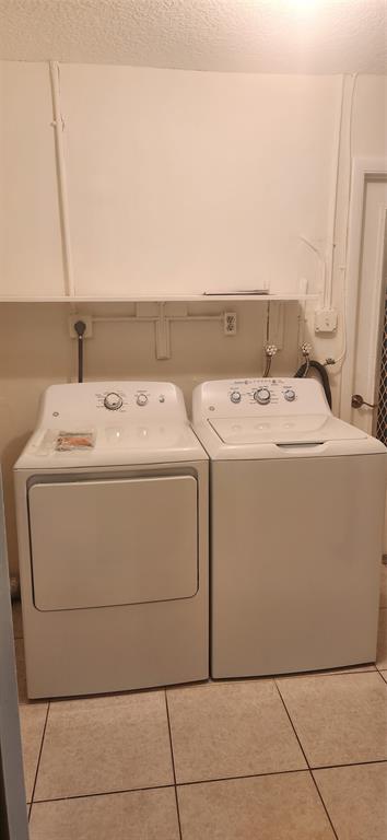 Undisclosed Address Margate, FL 33063 - Photo 22 of 26 a utility room with dryer and washer