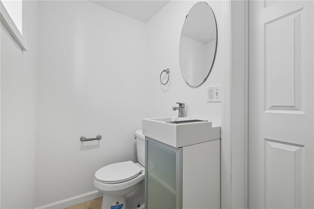 1824 Fox Way Pittsburgh, PA 15203 - Photo 17 of 49 a bathroom with a sink and a toilet