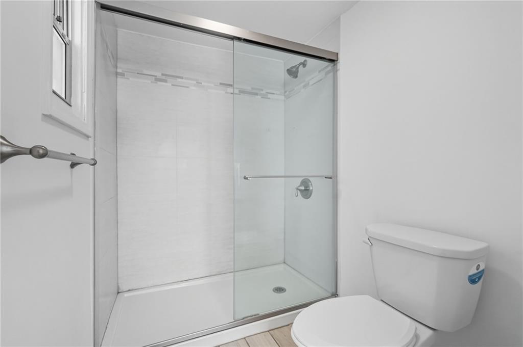 1824 Fox Way Pittsburgh, PA 15203 - Photo 23 of 49 a white toilet sitting next to a shower