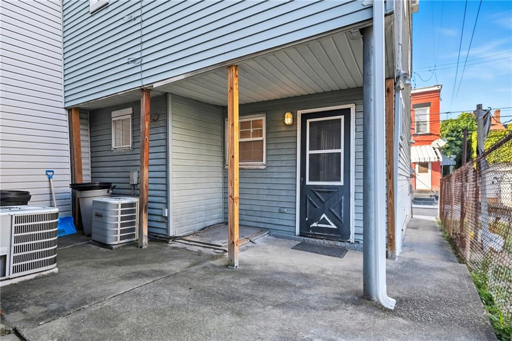 1824 Fox Way Pittsburgh, PA 15203 - Photo 26 of 49 a view of house that has a door and a chair