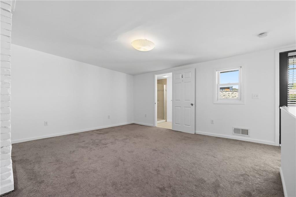 1824 Fox Way Pittsburgh, PA 15203 - Photo 40 of 49 an empty room with windows and closet