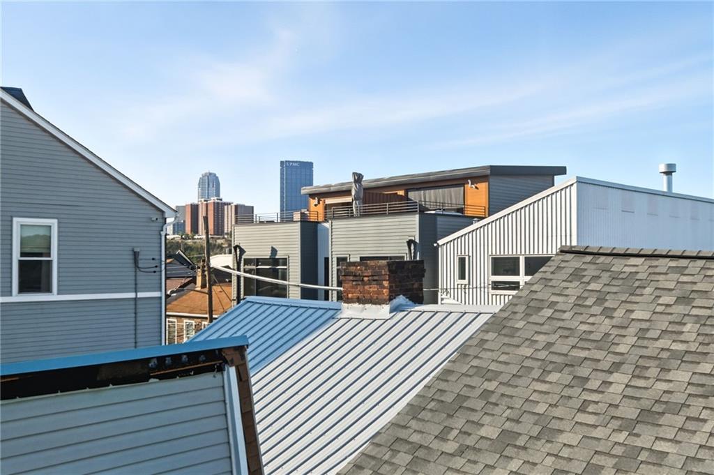 1824 Fox Way Pittsburgh, PA 15203 - Photo 45 of 49 a view of a house with wooden floor roof deck
