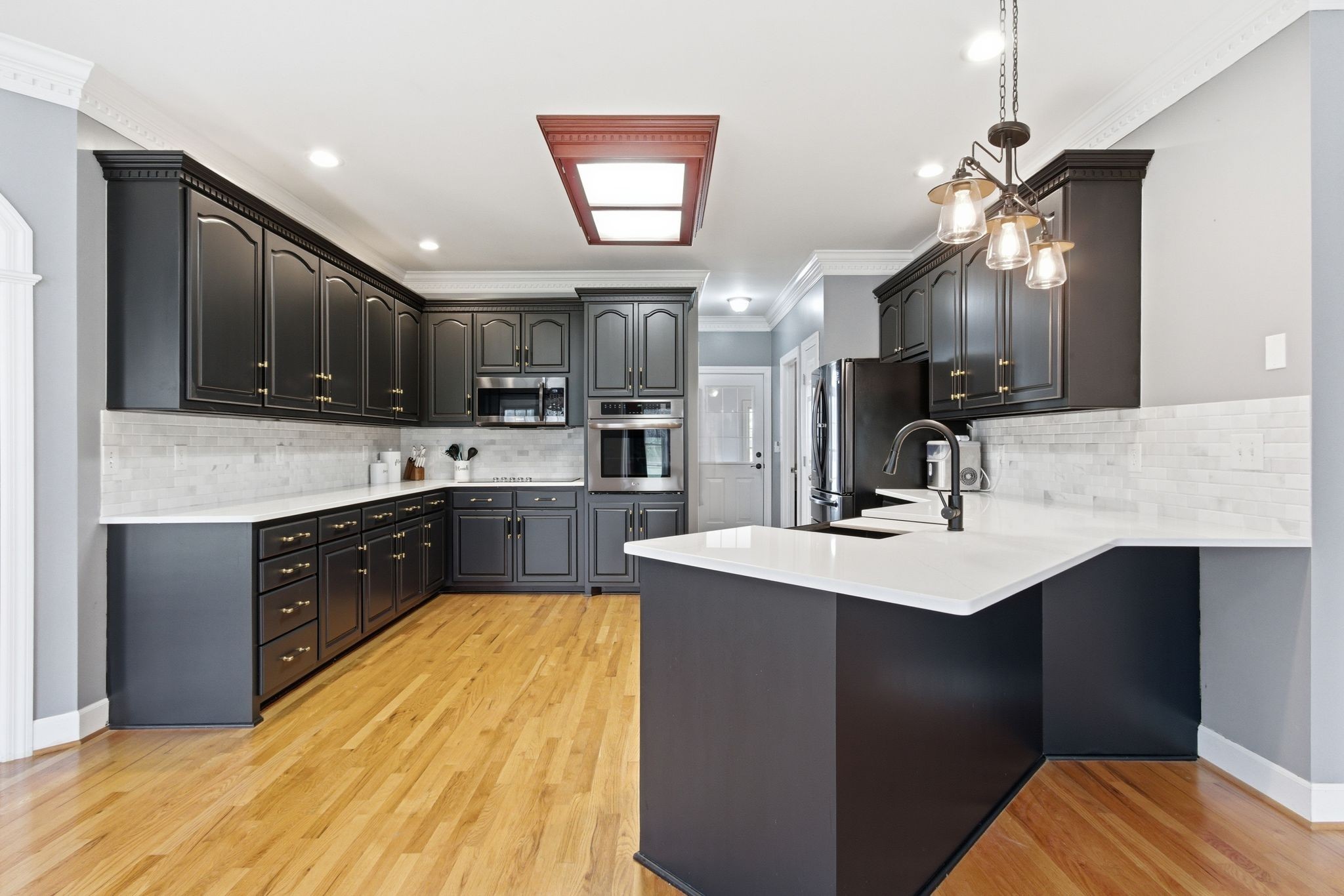 2320 Snake Town Road Chapel Hill, TN 37034 - Photo 18 of 48 a kitchen with a sink cabinets and window