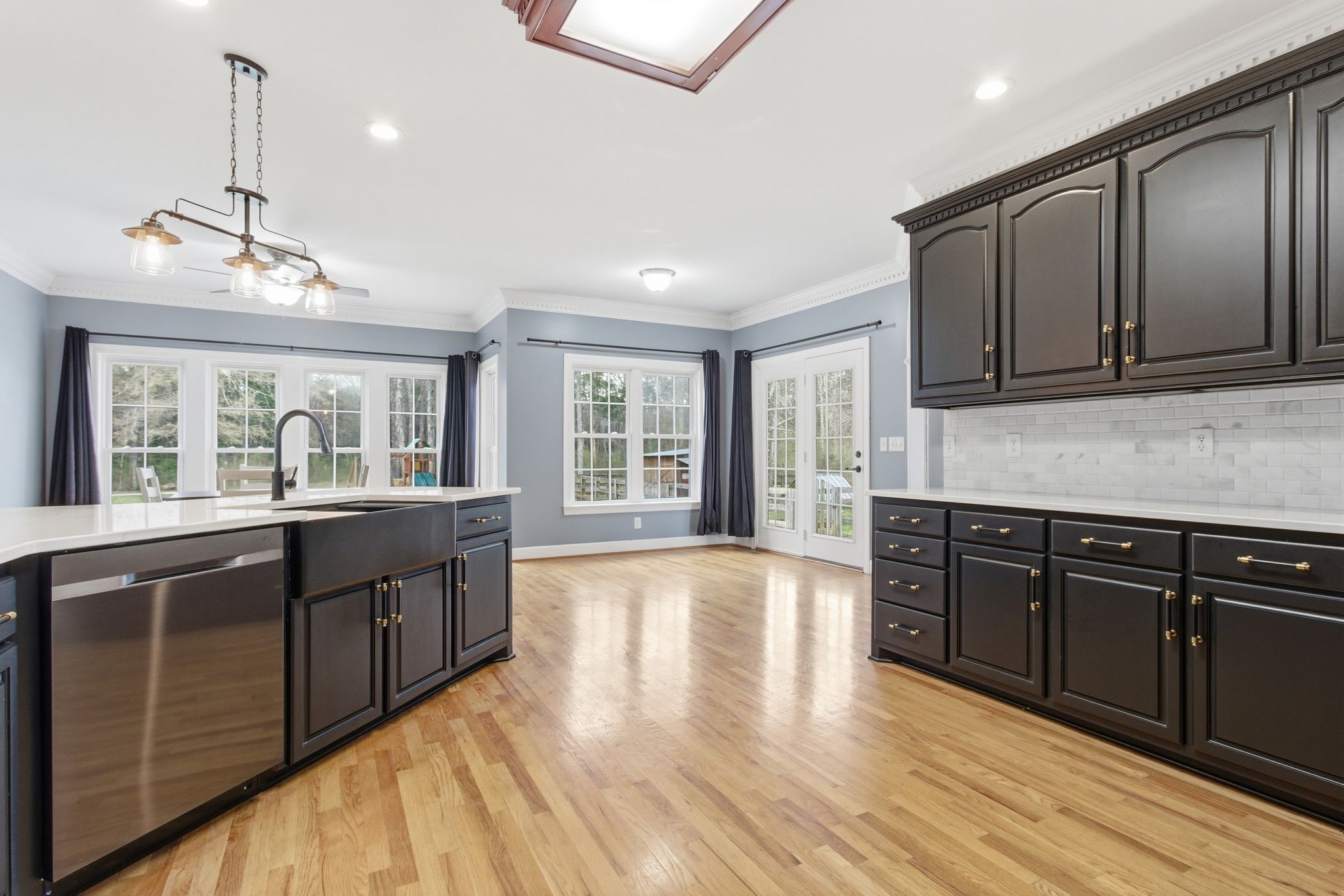 2320 Snake Town Road Chapel Hill, TN 37034 - Photo 20 of 48 a large kitchen with kitchen island granite countertop wooden cabinets a counter top space and stainless steel appliances