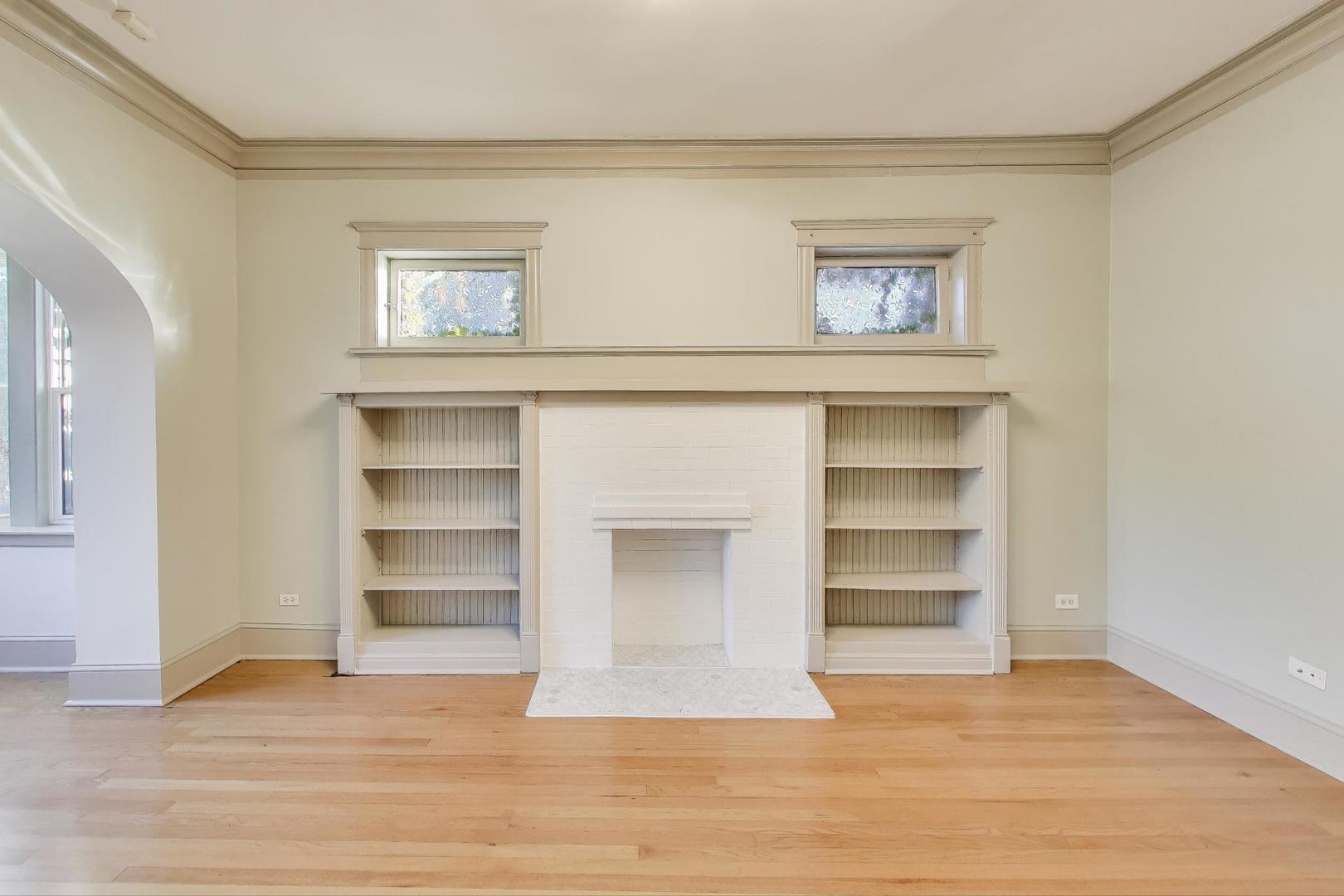6146 South Evans Avenue, Unit 2 Chicago, IL 60637 - Photo 4 of 20 a view of a room that has a door and a cabinet
