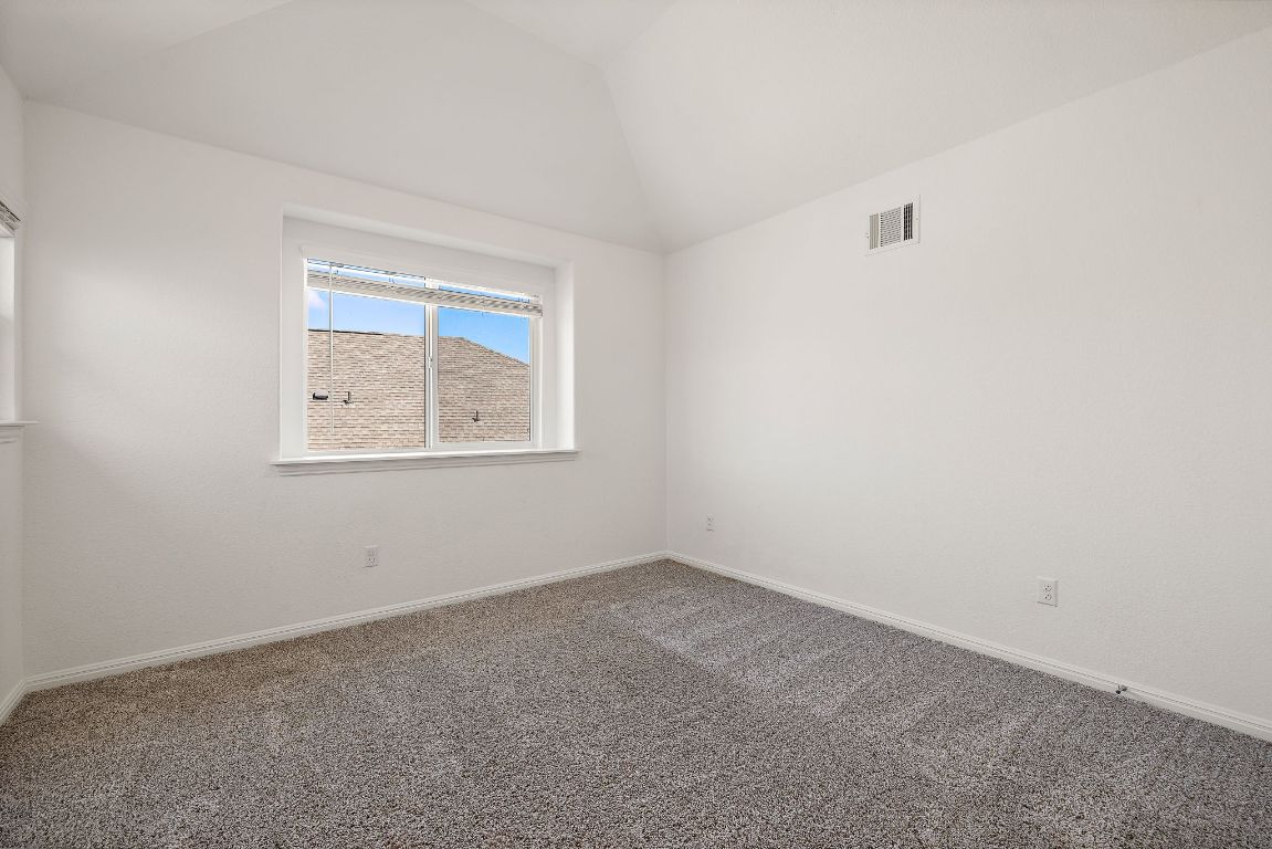 2021 Long Shadow Lane Georgetown, TX 78628 - Photo 27 of 36 an empty room with a window