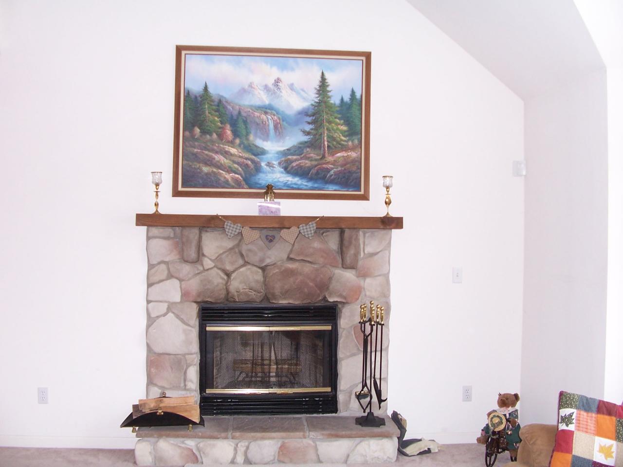 2725 Radcliff Road Bushkill, PA 18324 - Photo 6 of 9 a living room with a fireplace