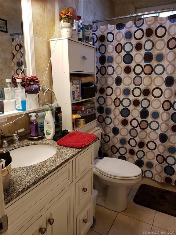 34 Katie Lane Waterbury, CT 06708 - Photo 5 of 15 a bathroom with a granite countertop toilet and a sink