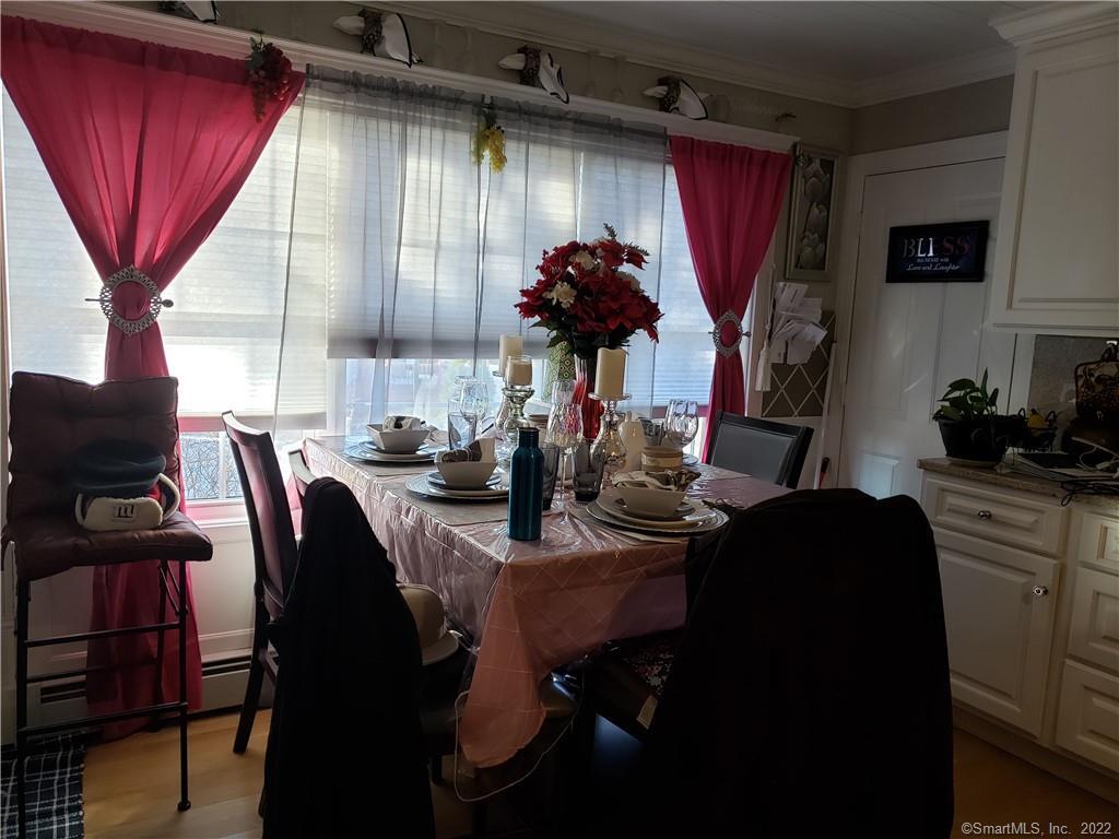 34 Katie Lane Waterbury, CT 06708 - Photo 6 of 15 a view of a dining room with furniture and window