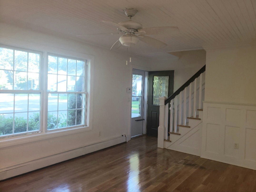 34 Katie Lane Waterbury, CT 06708 - Photo 10 of 15 a view of an entryway with wooden floor and door