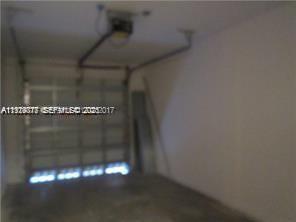 2442 Centergate Drive, Unit 205 Miramar, FL 33025 - Photo 14 of 40 a close view of water heater room