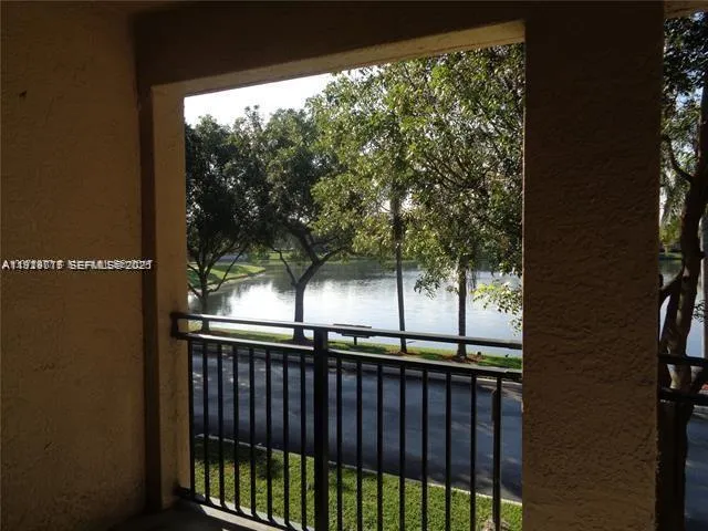 a view of street from balcony