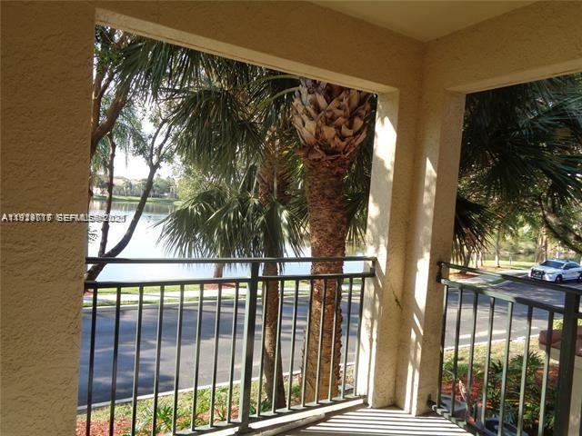 2442 Centergate Drive, Unit 205 Miramar, FL 33025 - Photo 32 of 40 a view of a balcony