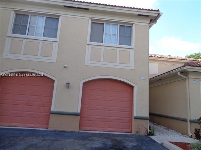 2442 Centergate Drive, Unit 205 Miramar, FL 33025 - Photo 36 of 40 a view of front door