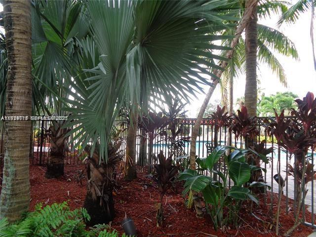 2442 Centergate Drive, Unit 205 Miramar, FL 33025 - Photo 39 of 40 a view of backyard of house