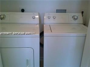 2442 Centergate Drive, Unit 205 Miramar, FL 33025 - Photo 5 of 40 a view of washer and dryer