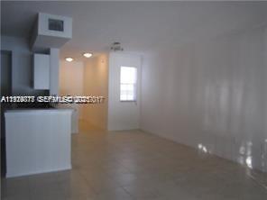 2442 Centergate Drive, Unit 205 Miramar, FL 33025 - Photo 6 of 40 a view of an empty room