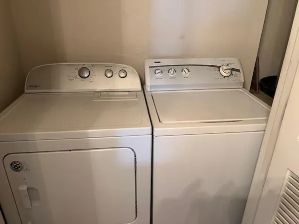 a close up view of washer and dryer with washer