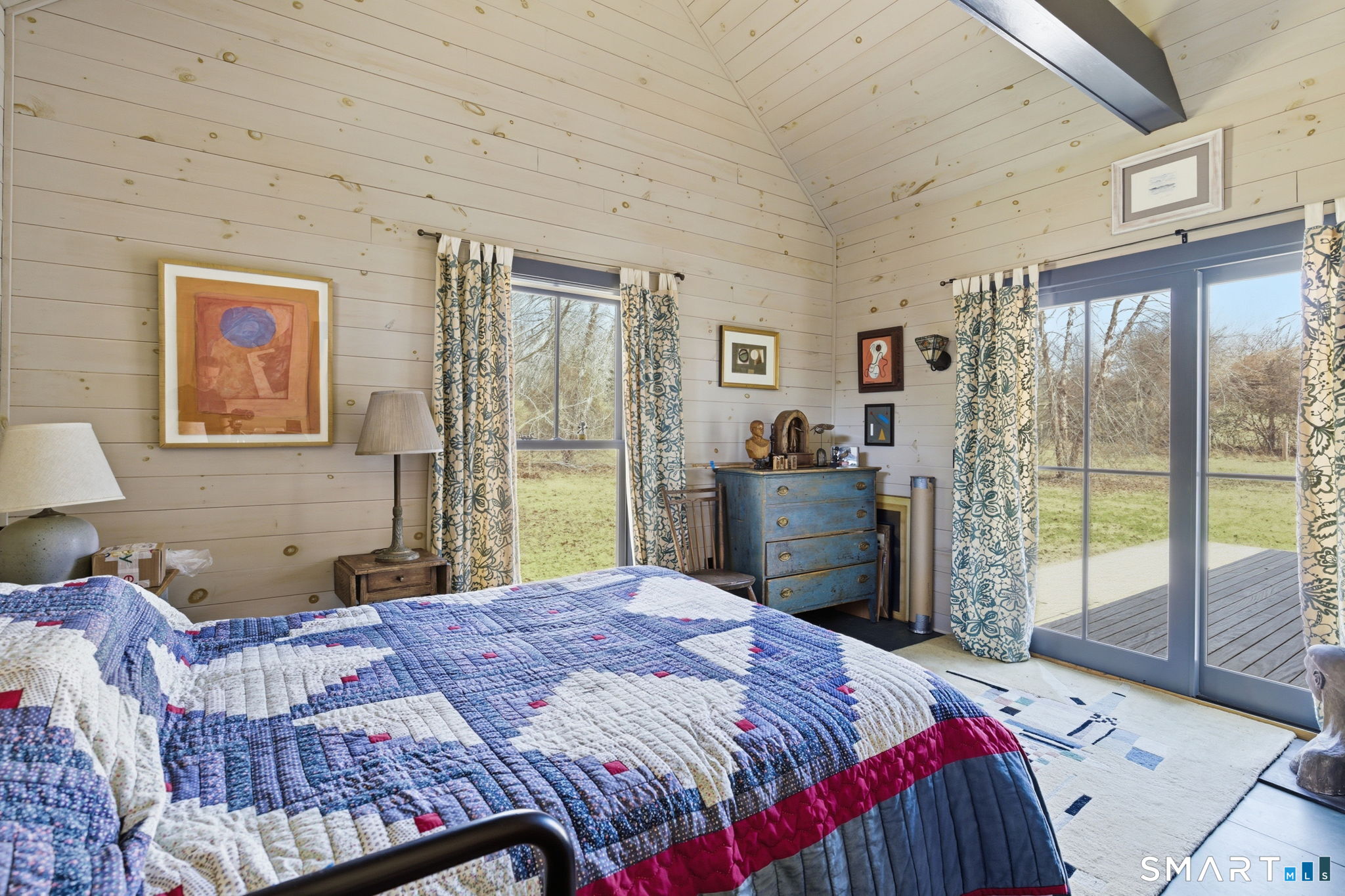 126 Beaver Brook Road Lyme, CT 06371 - Photo 12 of 37 Peaceful rest with access to the rear deck for morning coffee