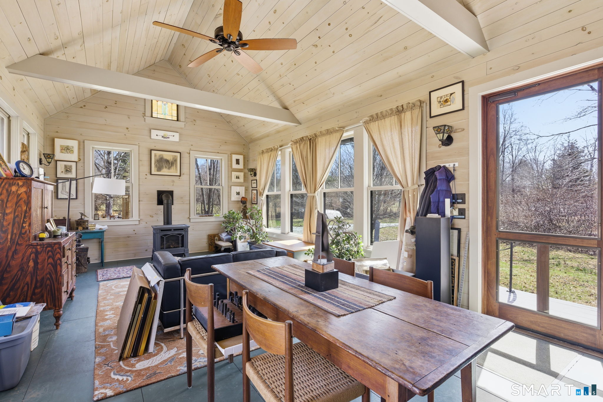 126 Beaver Brook Road Lyme, CT 06371 - Photo 7 of 37 living area is warm and cozy with stove