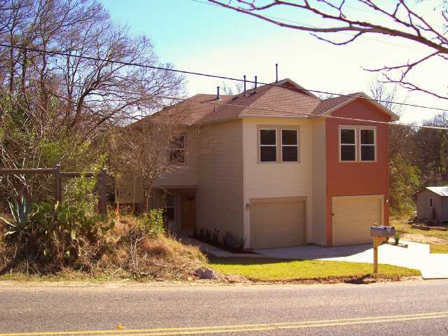 4803 Pecan Springs Road, Unit B Austin, TX 78723 - Photo 1 of 1 a view of a house with a small yard