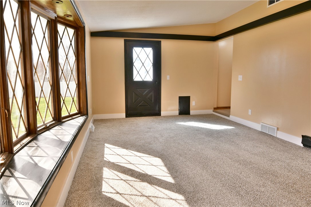 105 Fairview Avenue Cortland, OH 44410 - Photo 26 of 47 Foyer with light colored carpet and vaulted ceiling
