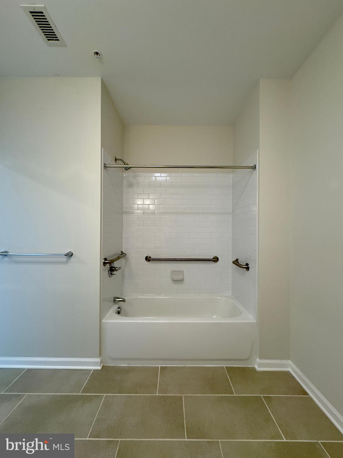 5902 Arizona Avenue, Unit 5902A Baltimore, MD 21206 - Photo 8 of 13 a view of a bathroom with a shower