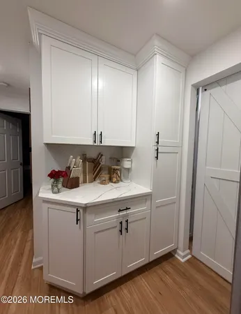 a kitchen with stainless steel appliances granite countertop a sink and cabinets
