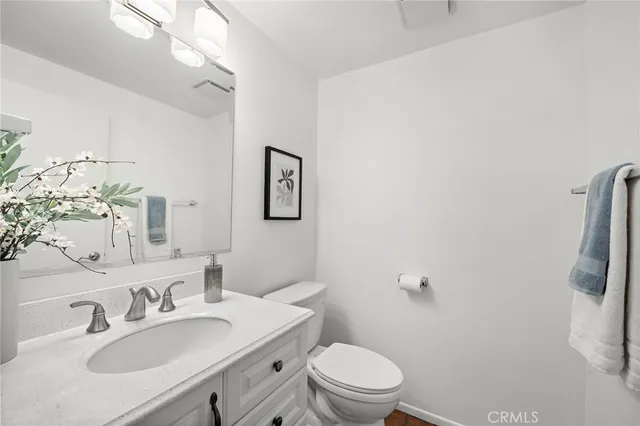 a kitchen with a sink stove top oven and microwave