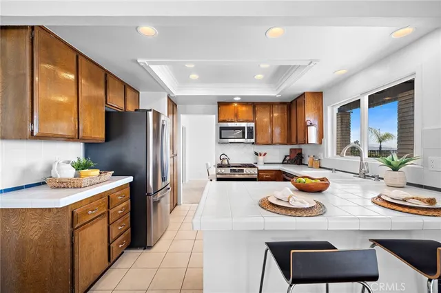 a bedroom with a bed and a table