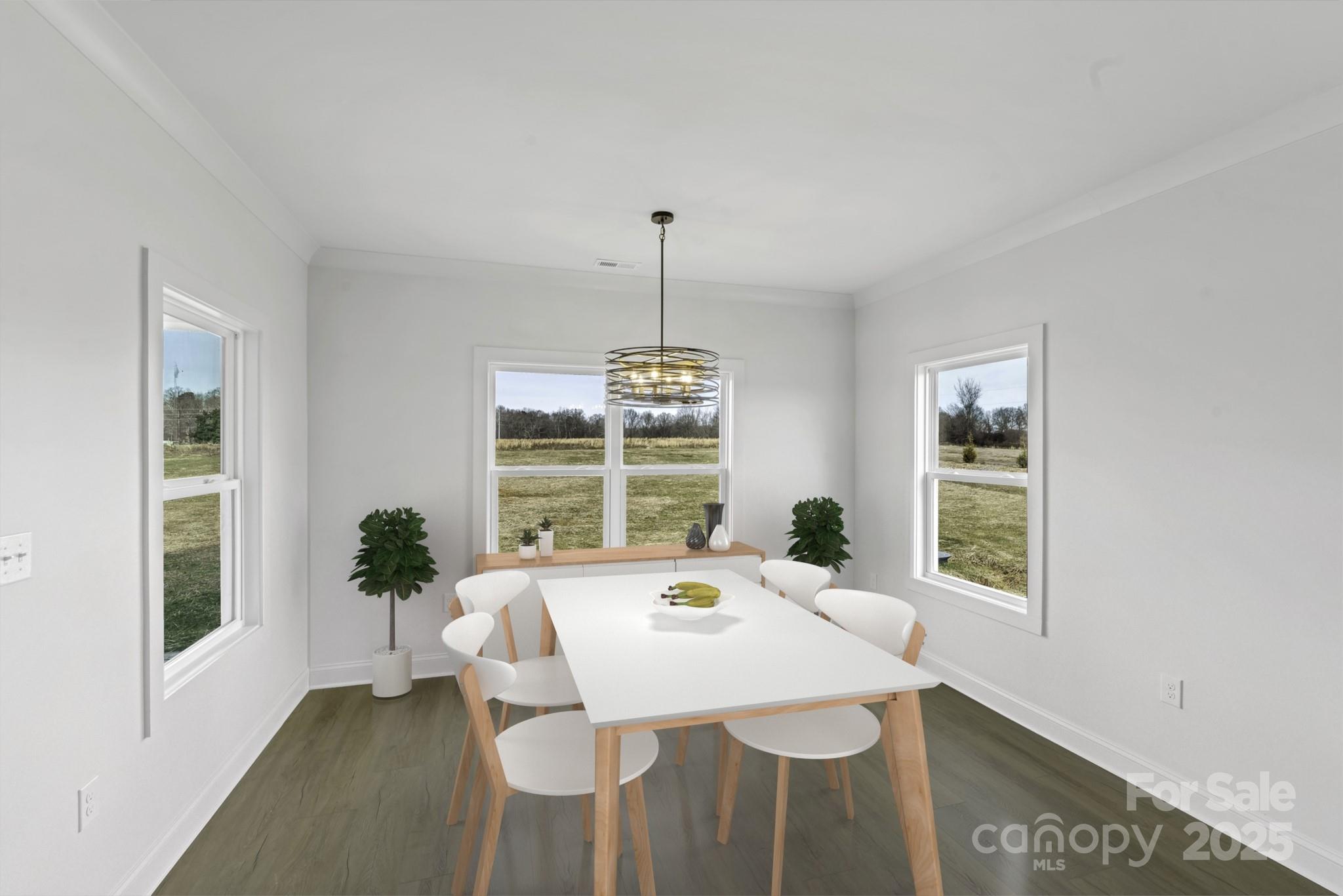 220 Lawyers Road Monroe, NC 28110 - Photo 14 of 36 a dining room with furniture and windows