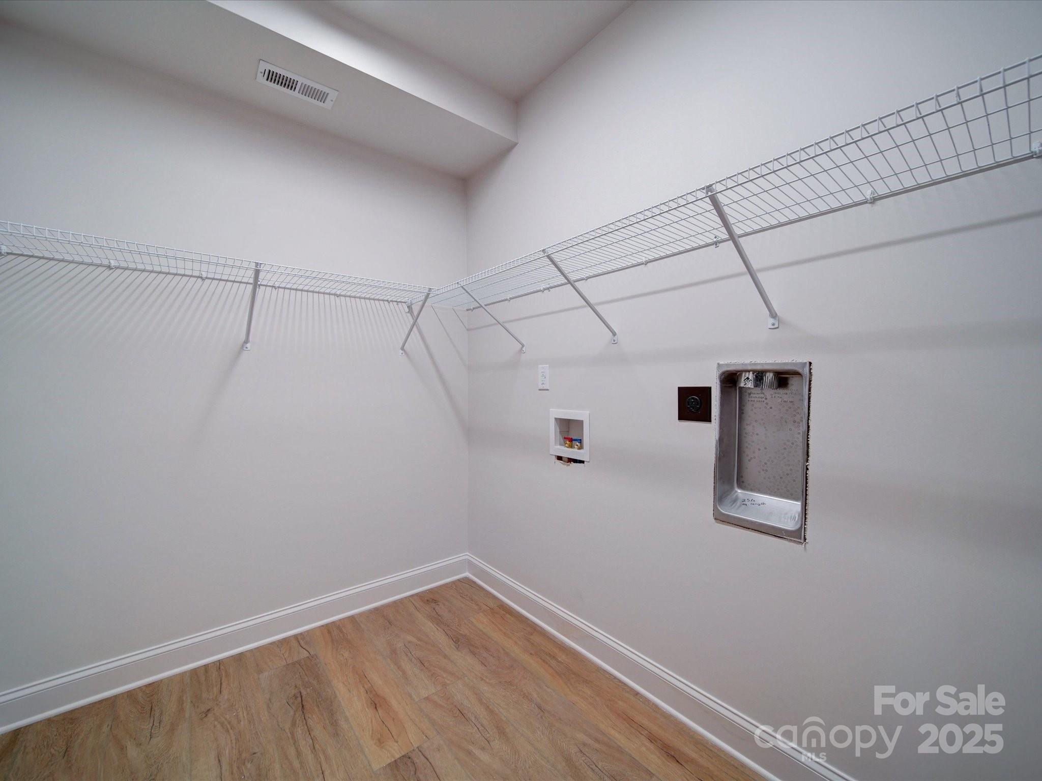 220 Lawyers Road Monroe, NC 28110 - Photo 17 of 36 a view of a room with racks on the wall