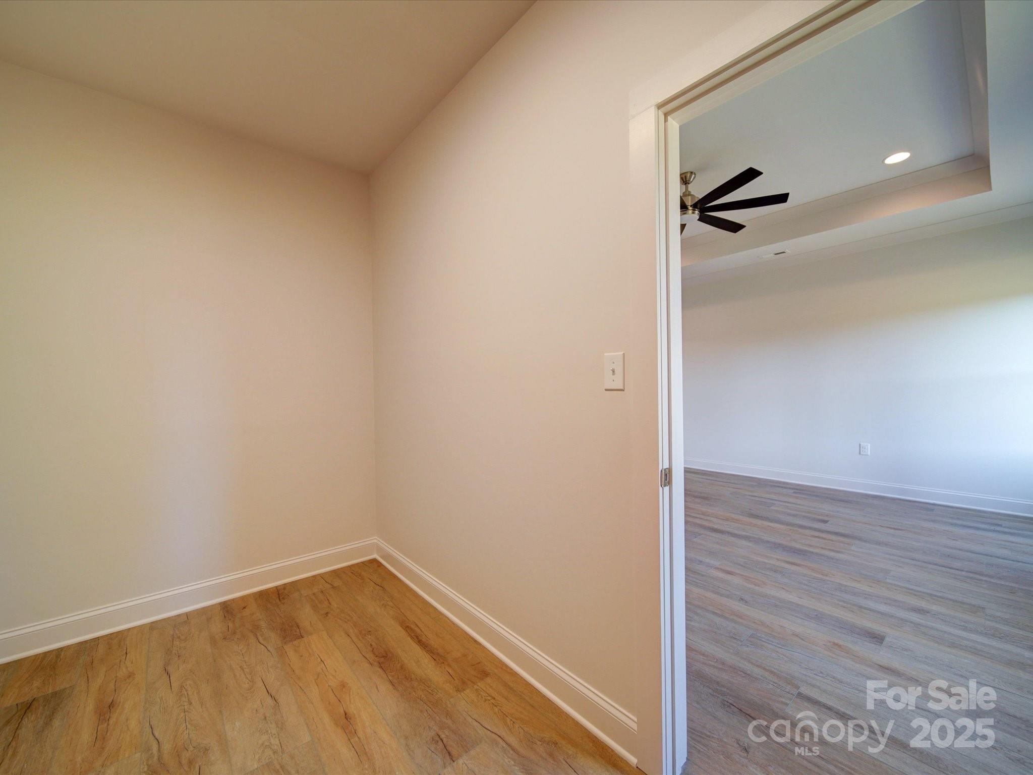 220 Lawyers Road Monroe, NC 28110 - Photo 21 of 36 a view of empty room with wooden floor