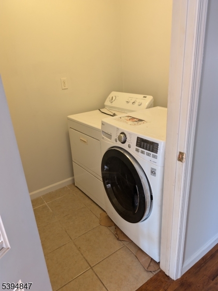 73 Fulton Street Elizabeth Port, NJ 07206 - Photo 20 of 23 a utility room with dryer and washer